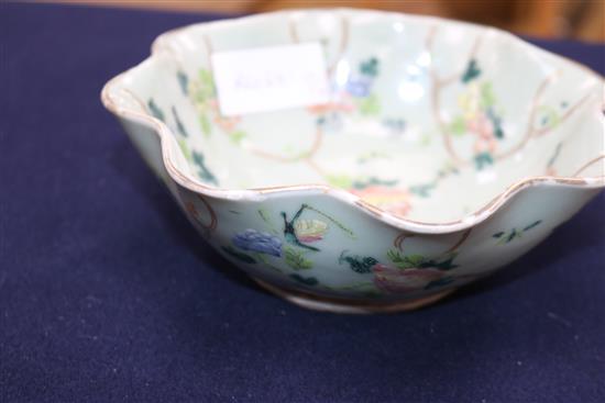 A Chinese celadon glazed dish, a Jun type tripod dish and a famille rose bowl and cover